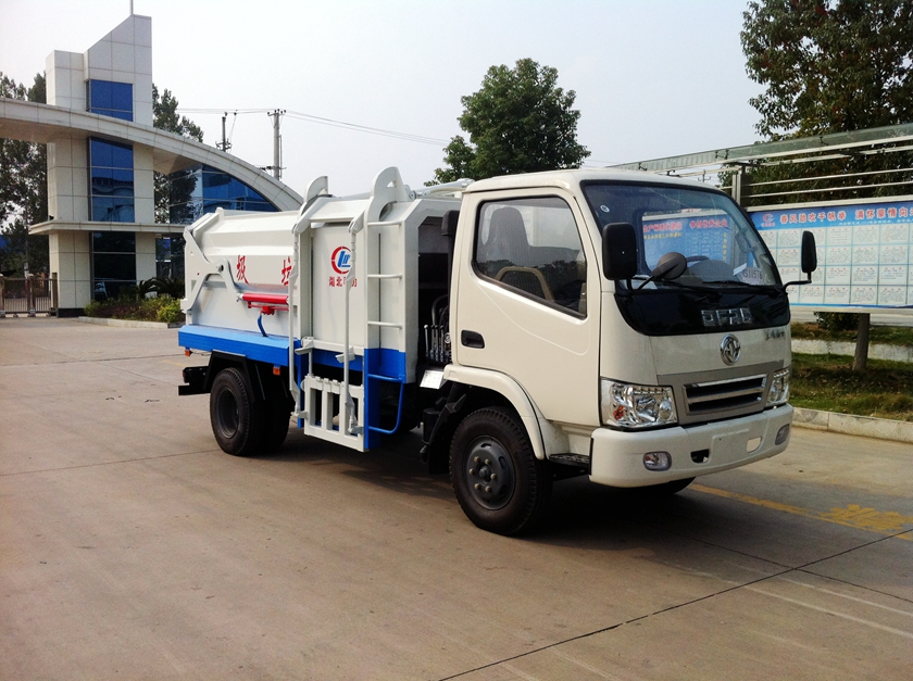 东风福瑞卡侧装挂桶式垃圾压缩车图片,东风福瑞卡侧装压缩车图片,东风福瑞卡侧装压缩垃圾车图片