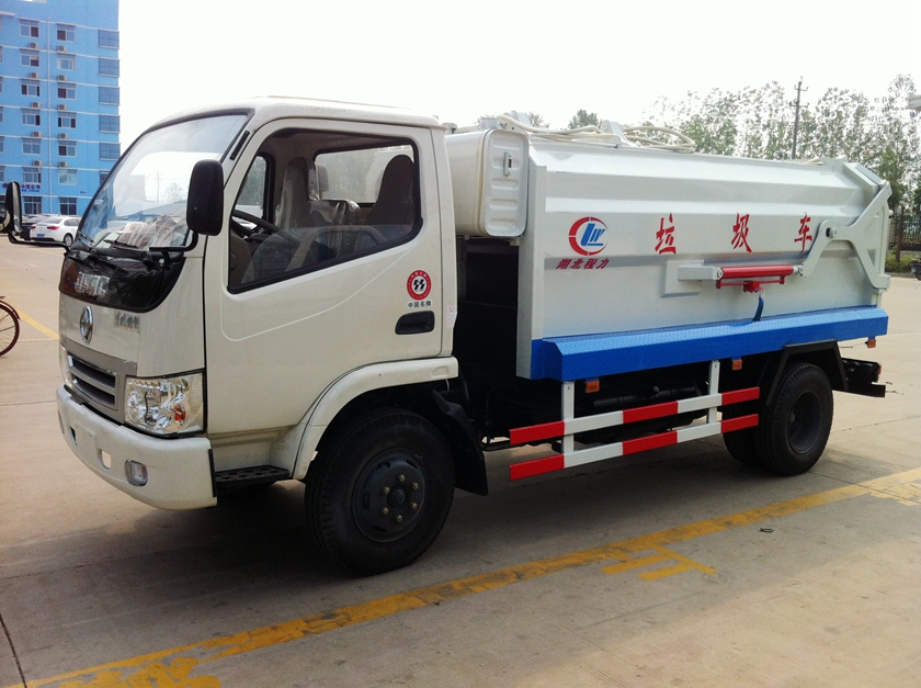 东风福瑞卡侧装挂桶式垃圾压缩车图片,东风福瑞卡侧装压缩车图片,东风福瑞卡侧装压缩垃圾车图片
