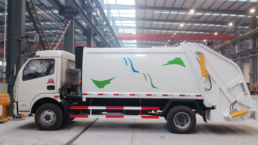 东风多利卡后装式压缩垃圾车照片,东风多利卡压缩垃圾车图片